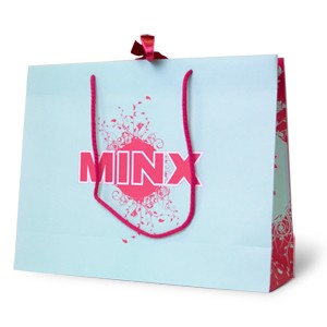 turquoise and pink paper bag with long rope handles